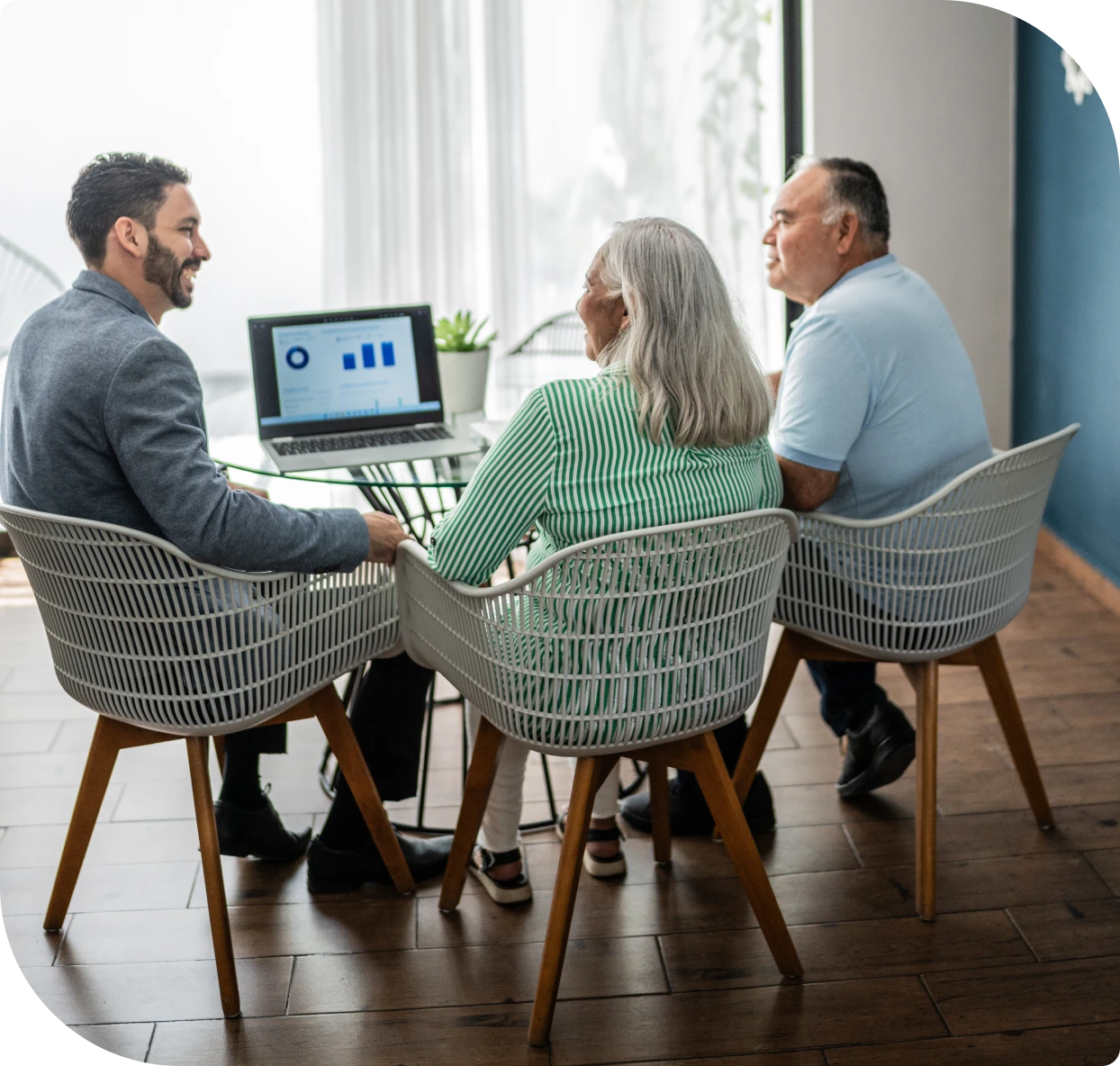 Meeting with financial advisor and couple.